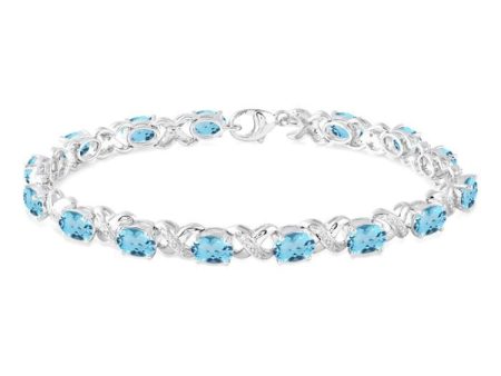 7x5  MM Oval Cut Blue Topaz and 1 20 Ctw Round Cut Diamond Fashion Bracelet in Sterling Silver Online now